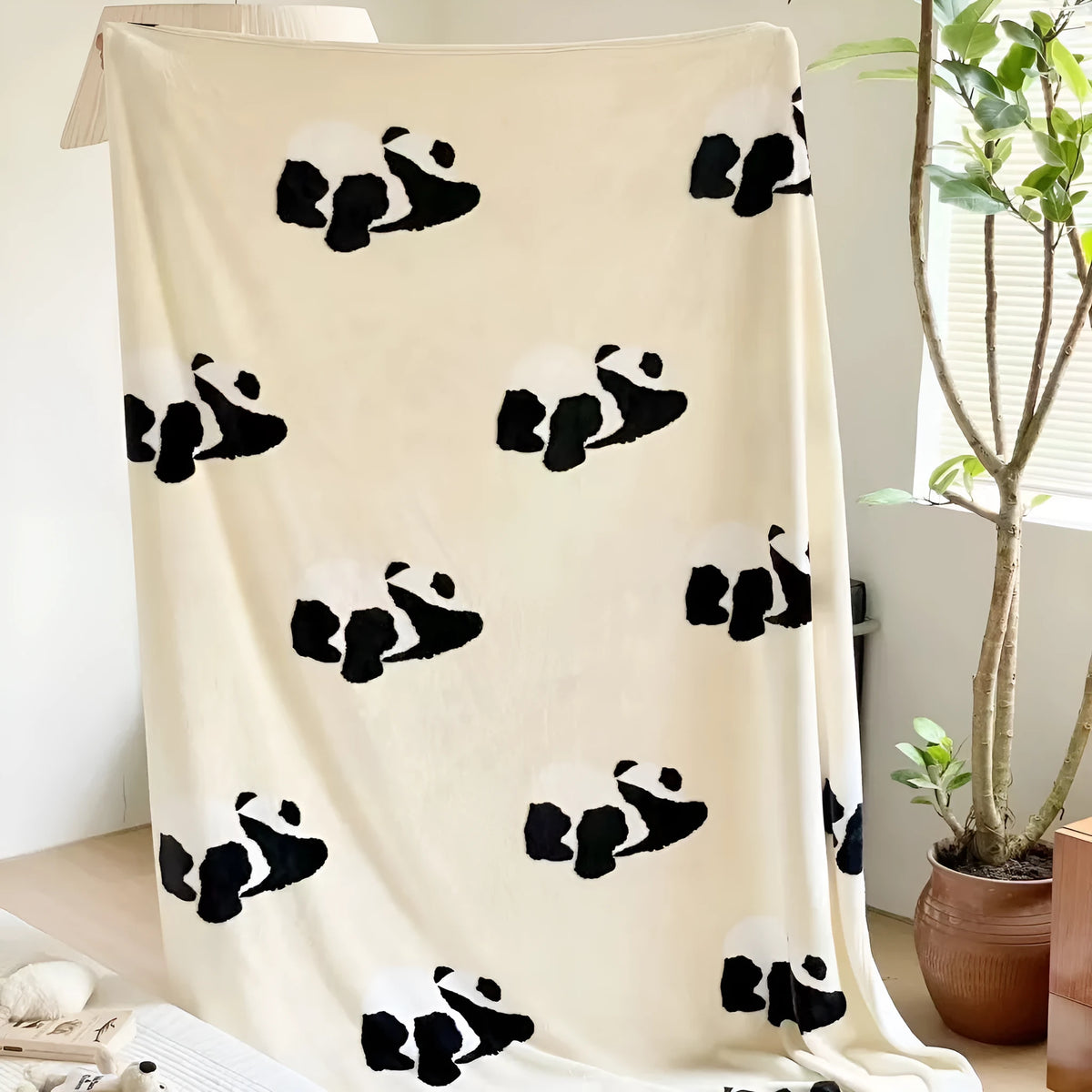 Panda cartoon pattern flannel blanket measuring 150x200cm on single bed
