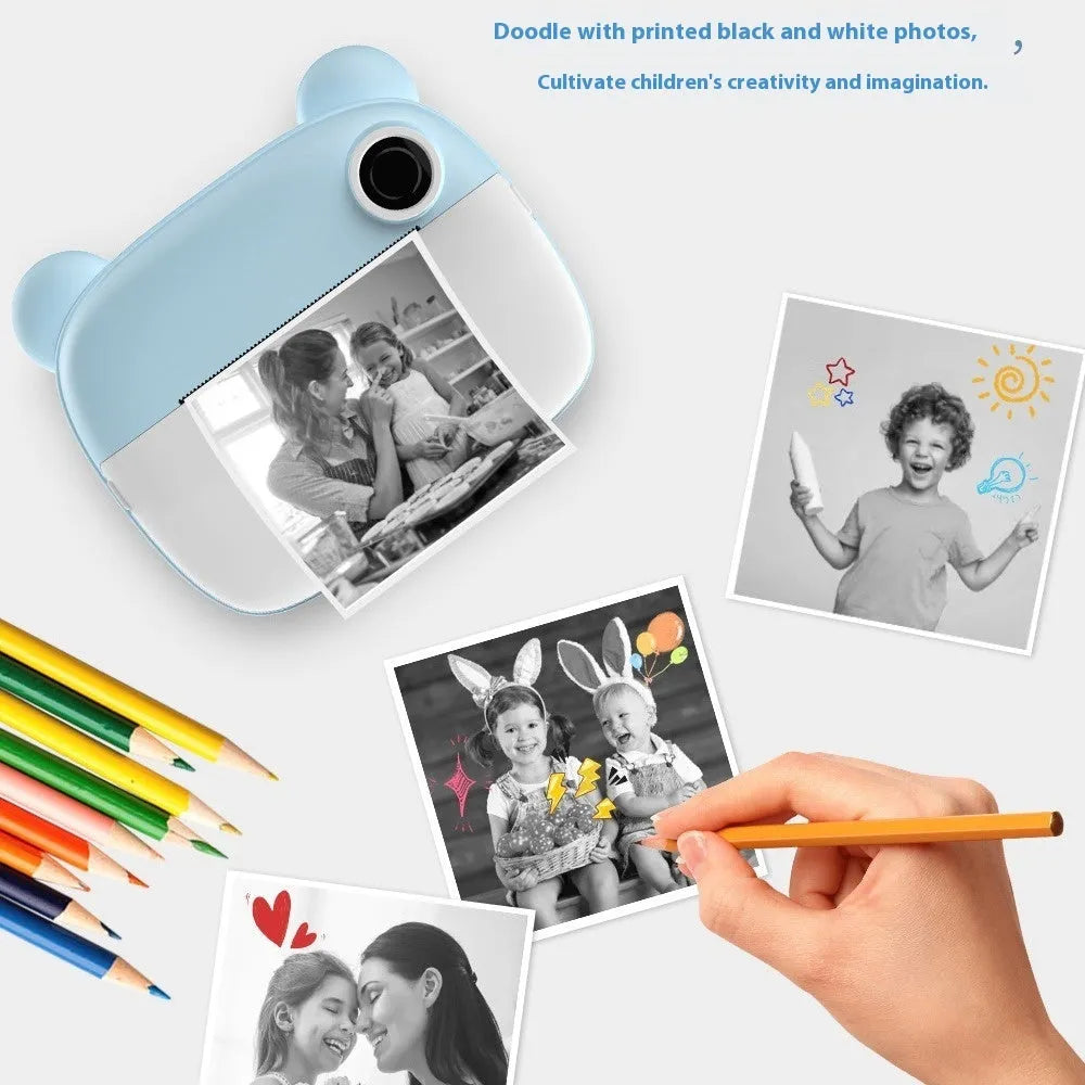 Children's SLR-style toy camera in pink with double lens, games and photo sticker functions