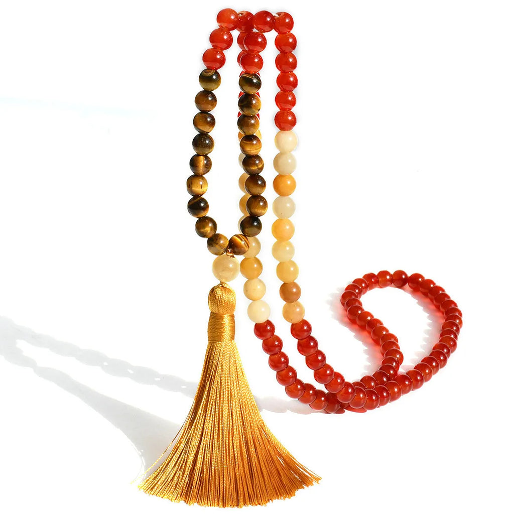 Long beaded bohemian necklace with 108 gemstone tassel pendants on a ball chain.