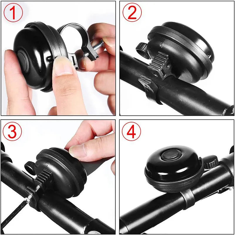 Black ABS plastic bicycle bell with 58mm diameter on a handlebar.