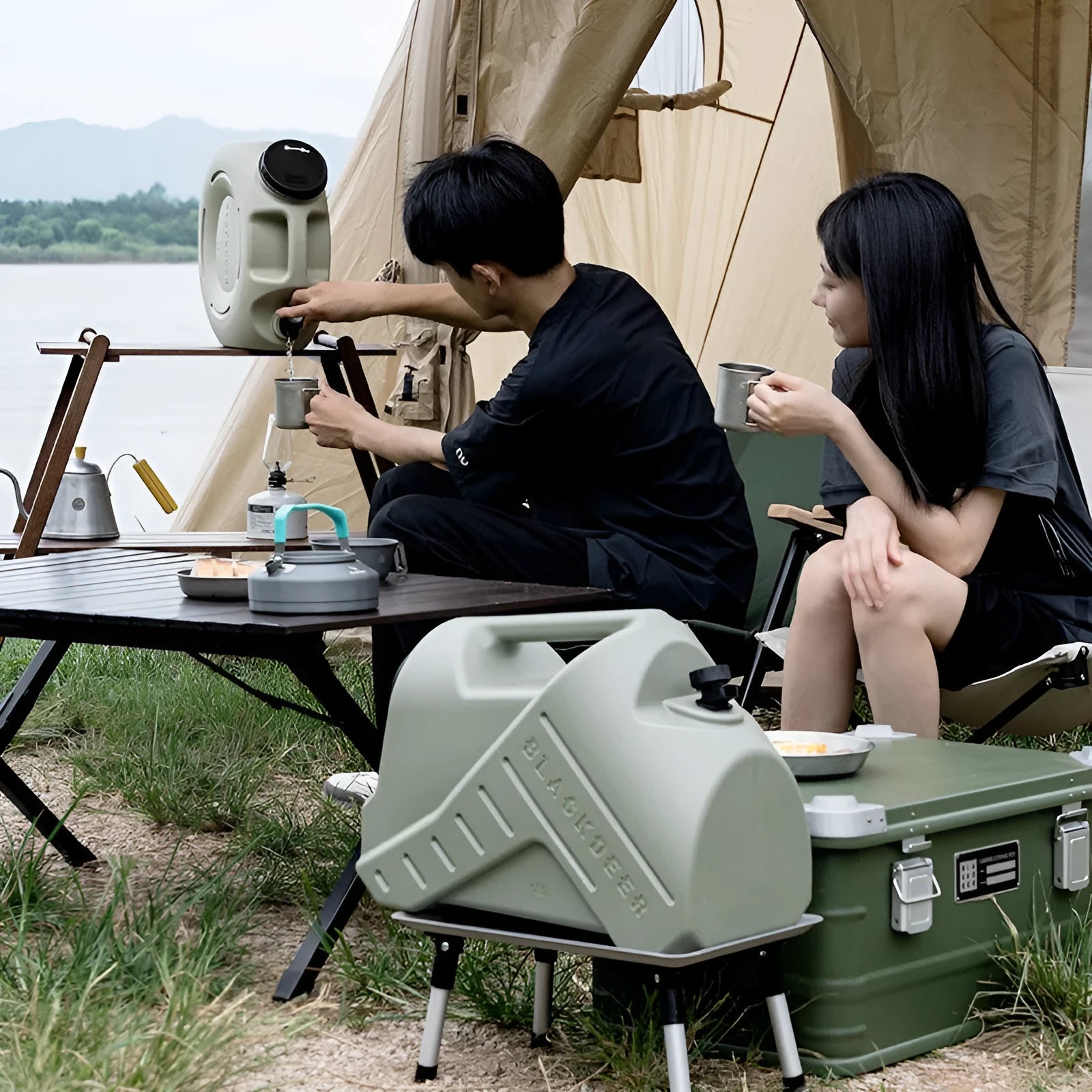 Green portable water storage tank in 13 litre or 18 litre size for camping and home use.