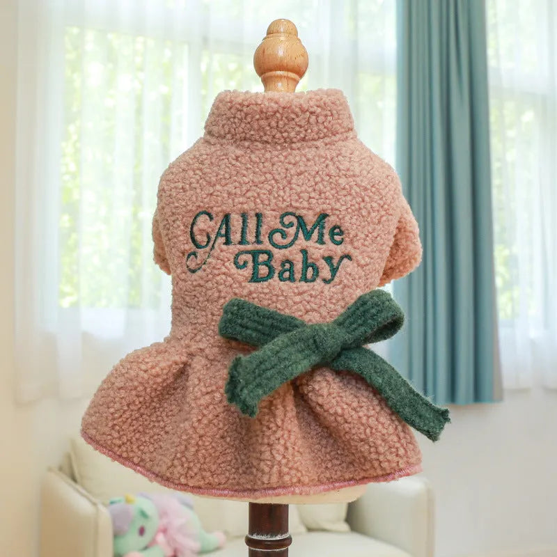 Pink fleece pet skirt with baby letter print for a small dog, showing size XS.