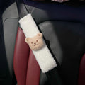 Cartoon bear design plush car seat belt protective cover for infant safety, showing khaki and coffee colour options