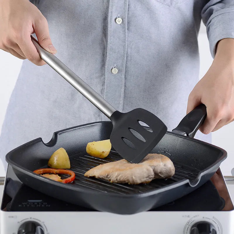 Black silicone and stainless steel 16-piece kitchen spatula and spoon set.