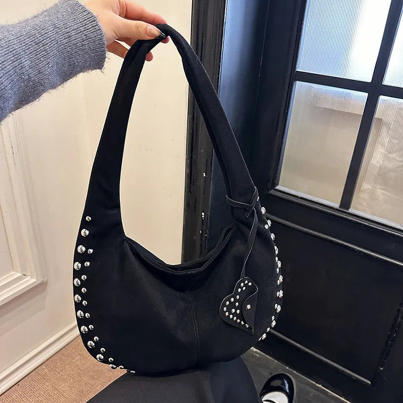 Soft plush retro style women's tote handbag held underarm in black, red, brown, green, and coffee colour options.