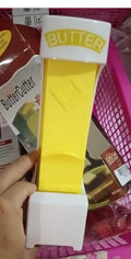 Yellow plastic butter slicer and storage box with a one-button dispenser for standard 4.75 inch butter bars.