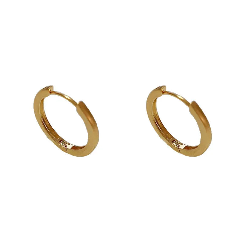 Women's geometric ear clips with round elements in gold and silver colours, real gold-plated copper construction