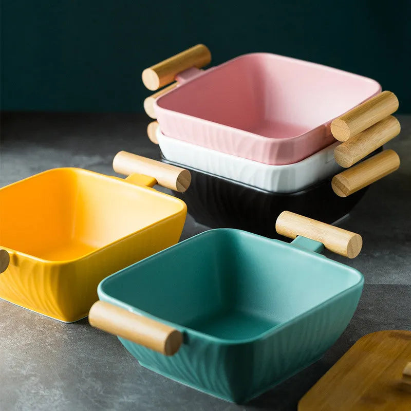 Ceramic serving bowl with lid in irregular modern shape, heat-resistant porcelain construction