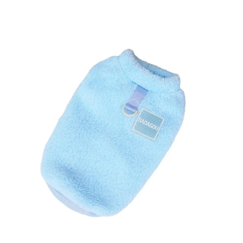 Blue coral fleece pet jacket for a dog, showing the coloured pull ring fastening.