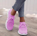 Women's breathable platform sneakers in multiple colours on a white background, showing lace-up front and flat rubber sole.