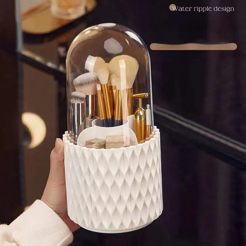 White rotating acrylic makeup brush storage box with transparent lid on desktop