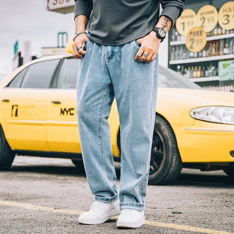 Men's loose straight jeans in dark blue cotton with mid-waist fit and straight leg cut