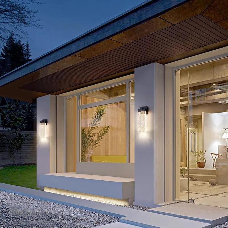 Black stainless steel outdoor LED wall lamp showing two size options for courtyard and corridor mounting