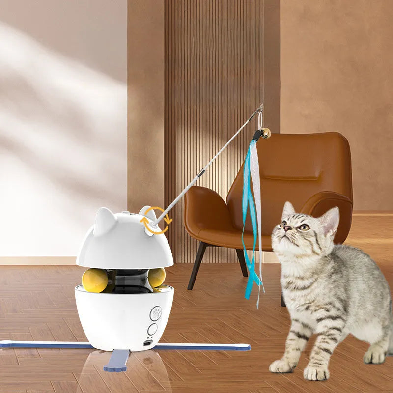 White automatic rotating cat toy with elastic rope and fluffy ball extended during operation