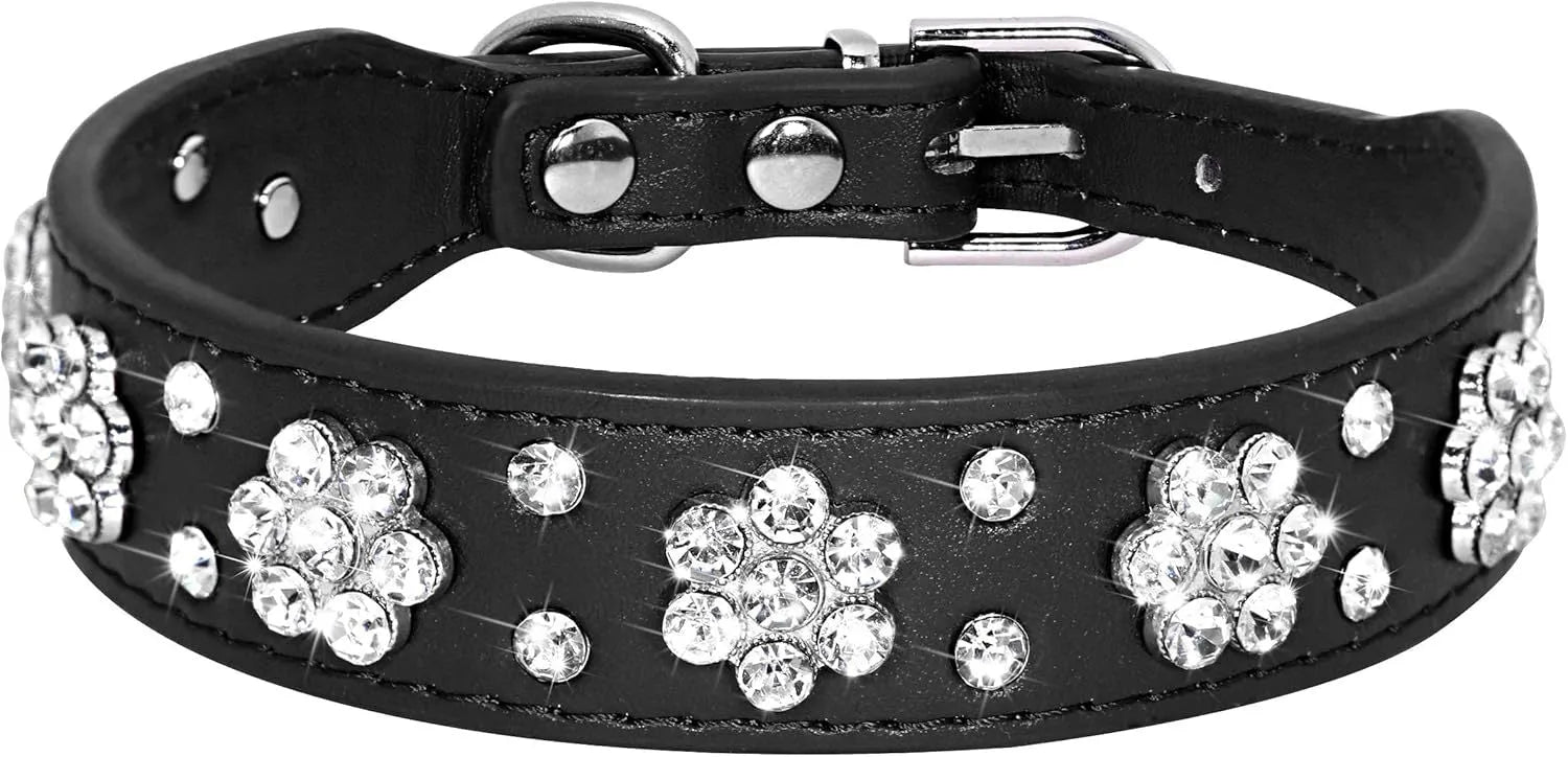Black PU leather dog collar with rhinestone flower pattern and studded design, adjustable with metal eyelets