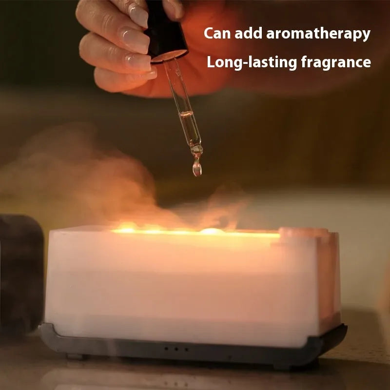 White USB aromatherapy diffuser with simulated flame and jellyfish smoke effect on wooden table