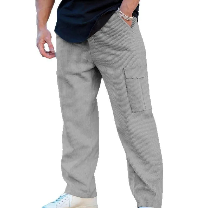 Men's navy blue corduroy trousers with straight-leg design and adjustable drawstring waist
