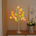 60cm white LED birch tree light with black bark lines and cracked egg ornaments on adjustable branches