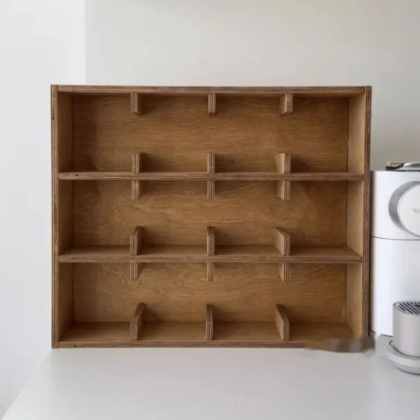 Solid birch wood cup storage rack with multiple grid compartments in meridian colour finish