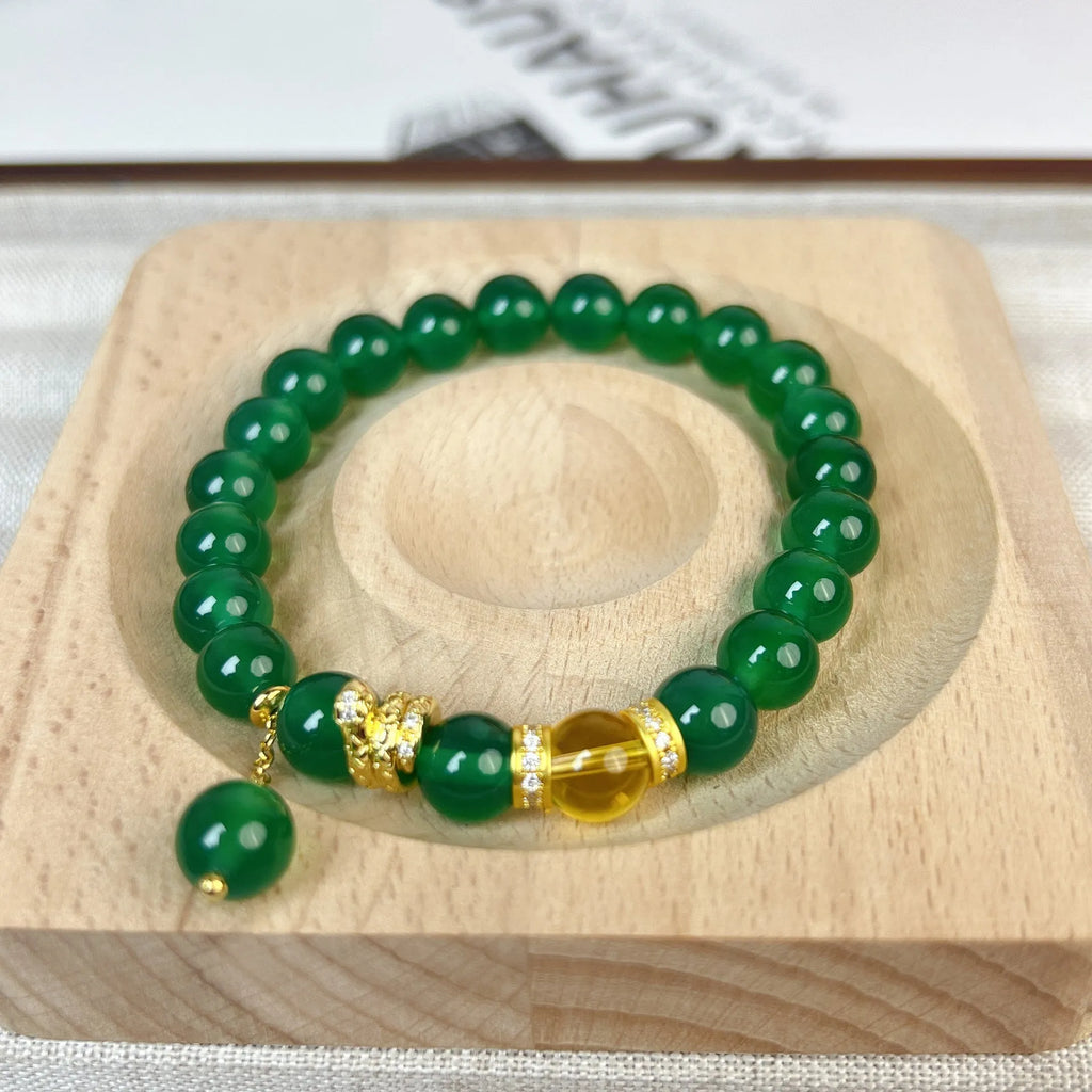 Green chalcedony and red agate roll wealth snake bracelet with copper fittings on wrist