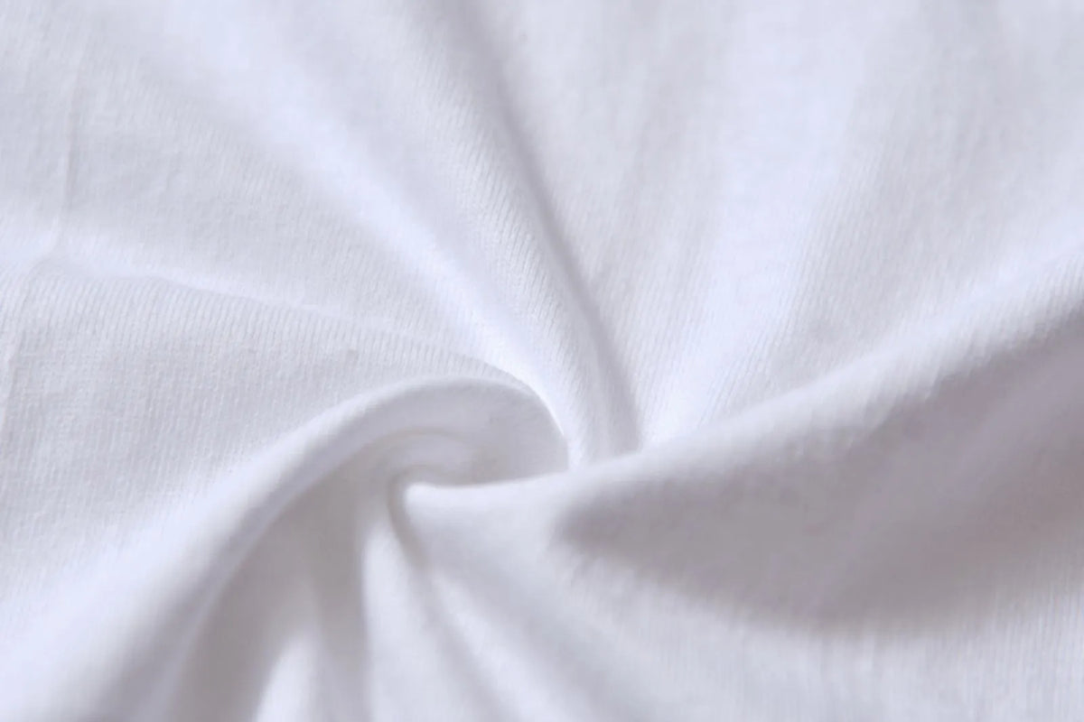 White cotton t-shirt overalls with round neck and short sleeves in patterned design
