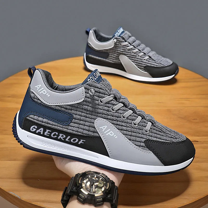 Men's grey and green mesh running shoes with low-top design and round toe