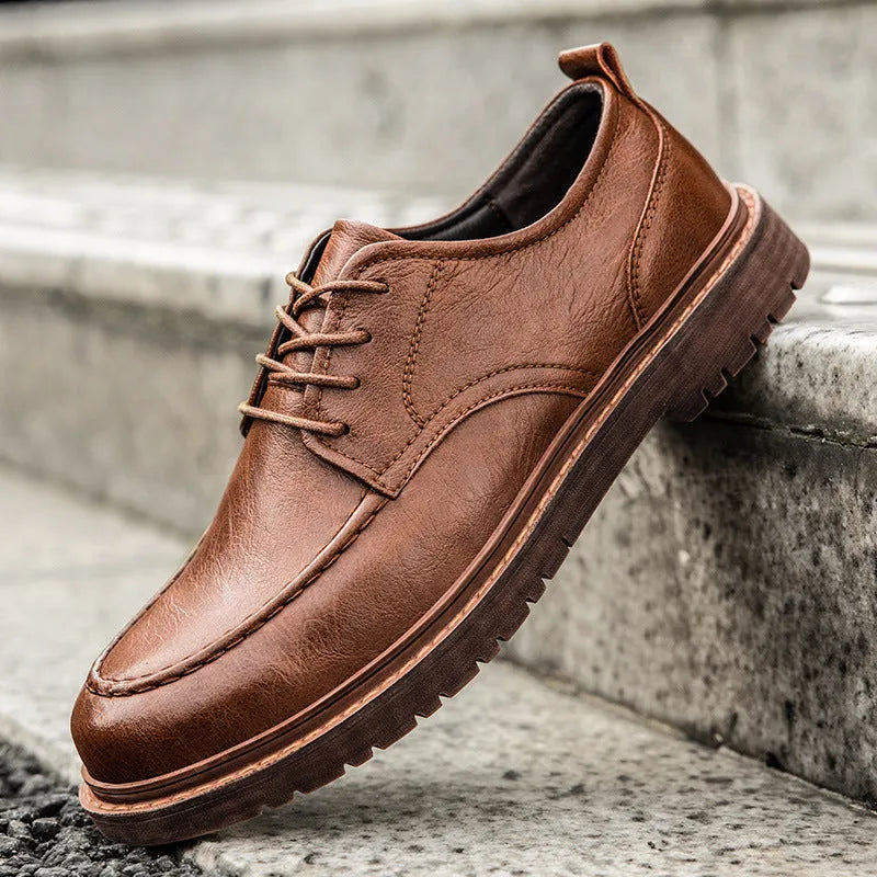 Black and brown tooling casual leather shoes with round toe and flat rubber sole
