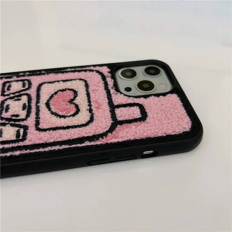 Pink TPU iPhone back cover case with a textured towel embroidery design.