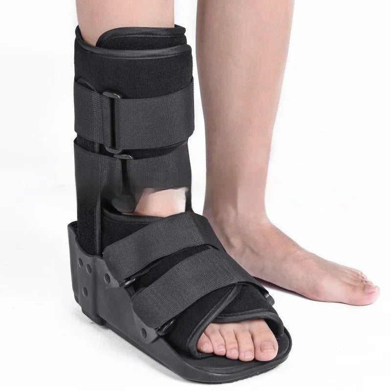 Achilles tendon rehabilitation walking shoes showing adjustable straps and hinge mechanism for ankle support