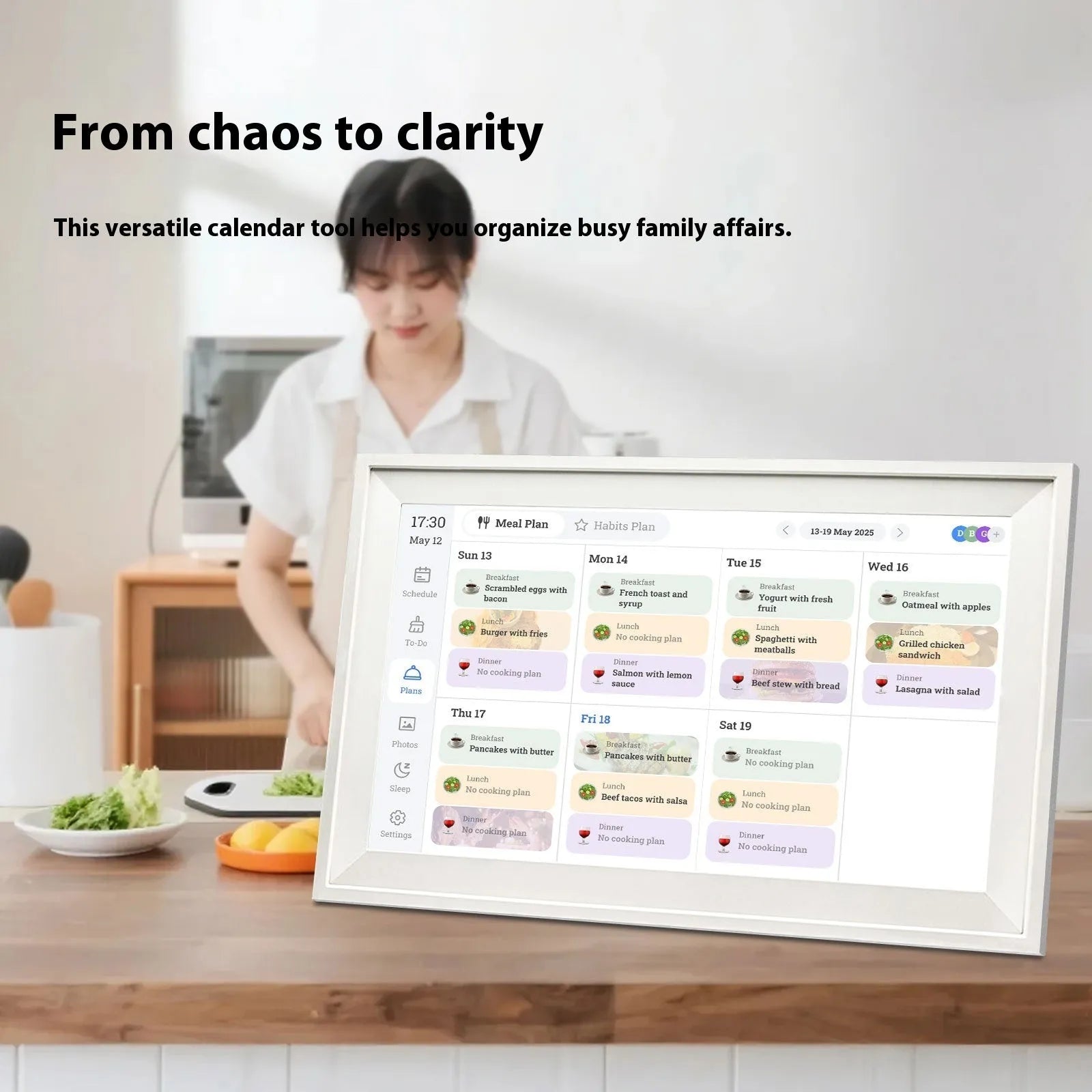 White smart digital photo frame with 15.6-inch display showing family photos, includes app control and UK power adapter