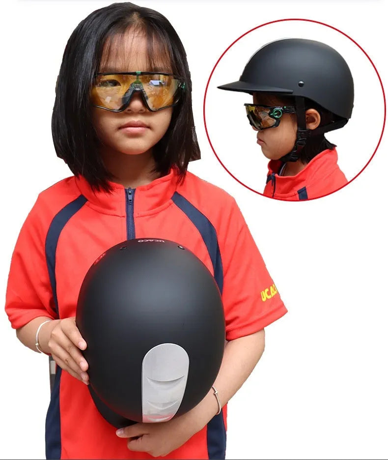 Lightweight equestrian helmet in silver black colour with ABS shell, shown from side view