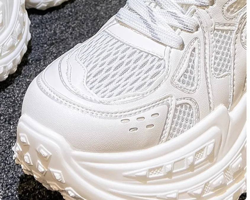 White women's lace-up dad shoes with a round toe and PU leather upper, featuring a hidden height increasing insole.
