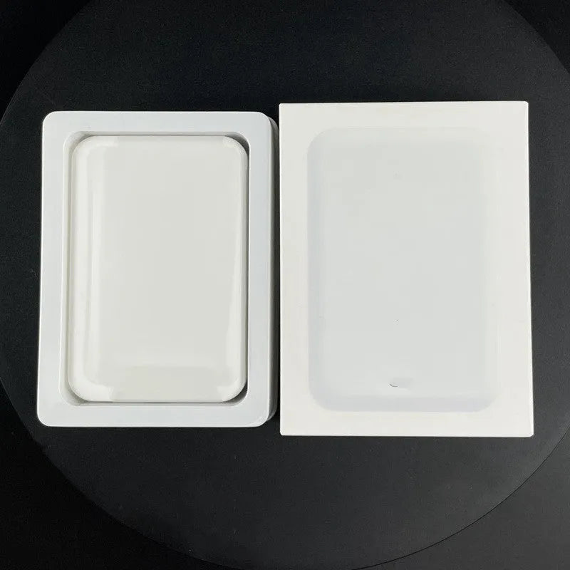 White magnetic wireless charger with 5000mAh power bank showing compact 100x65x16mm dimensions