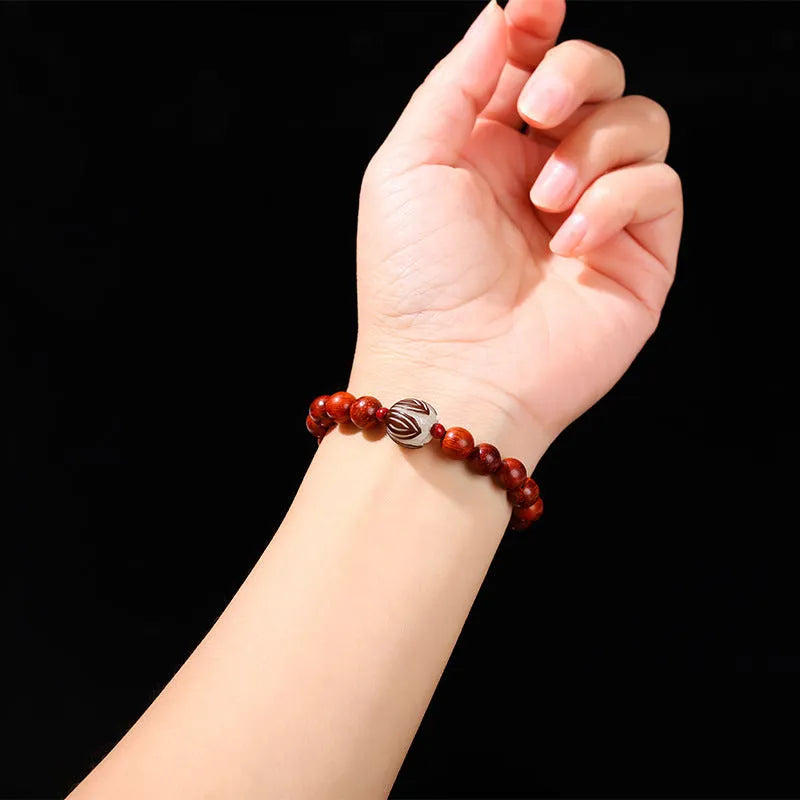 Women's red rosewood and grey jade bracelet with eight 12mm Bodhi lotus seed beads in Chinese style.