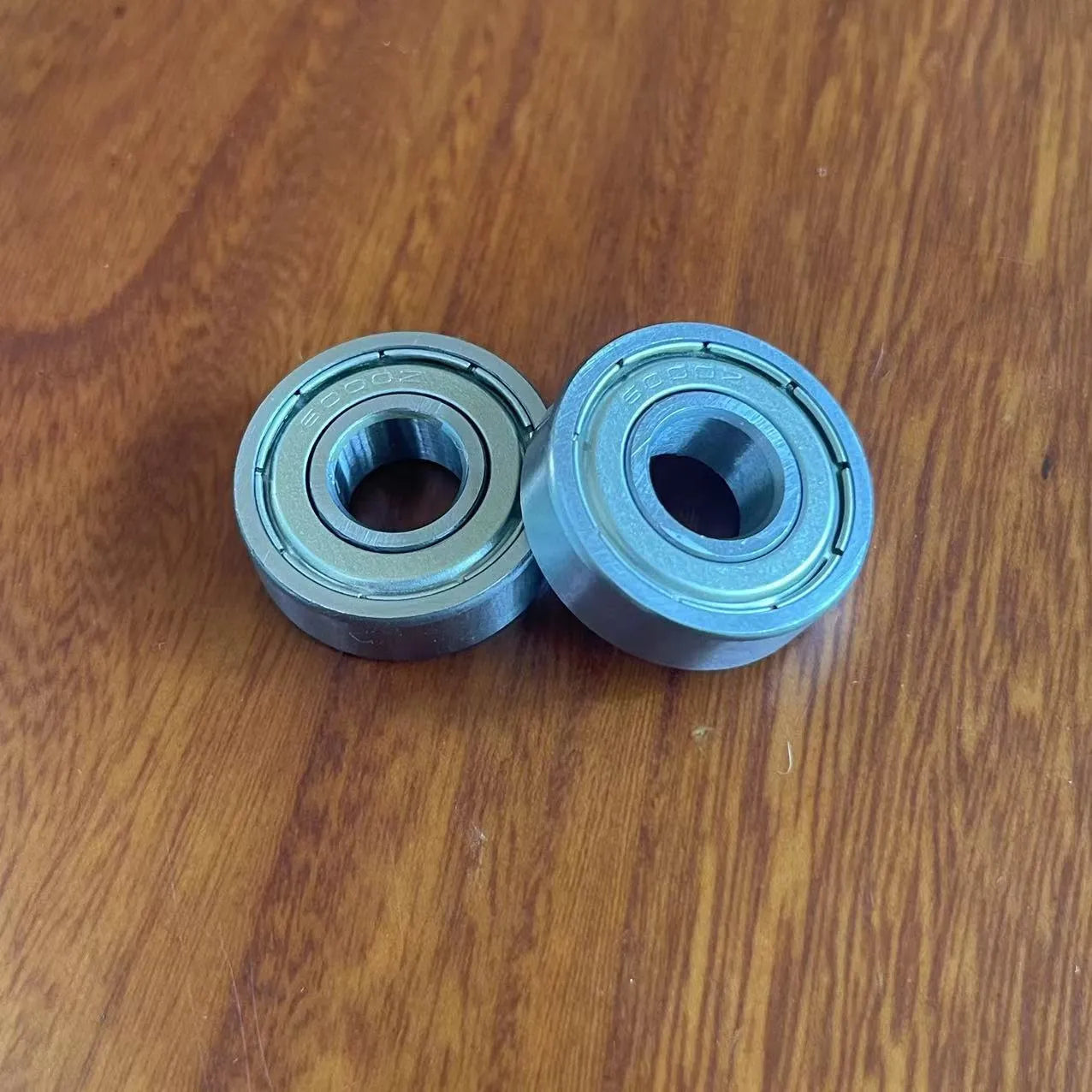 6000zz carbon steel radial ball bearing with 10mm bore, 26mm outer diameter, and steel retainer.