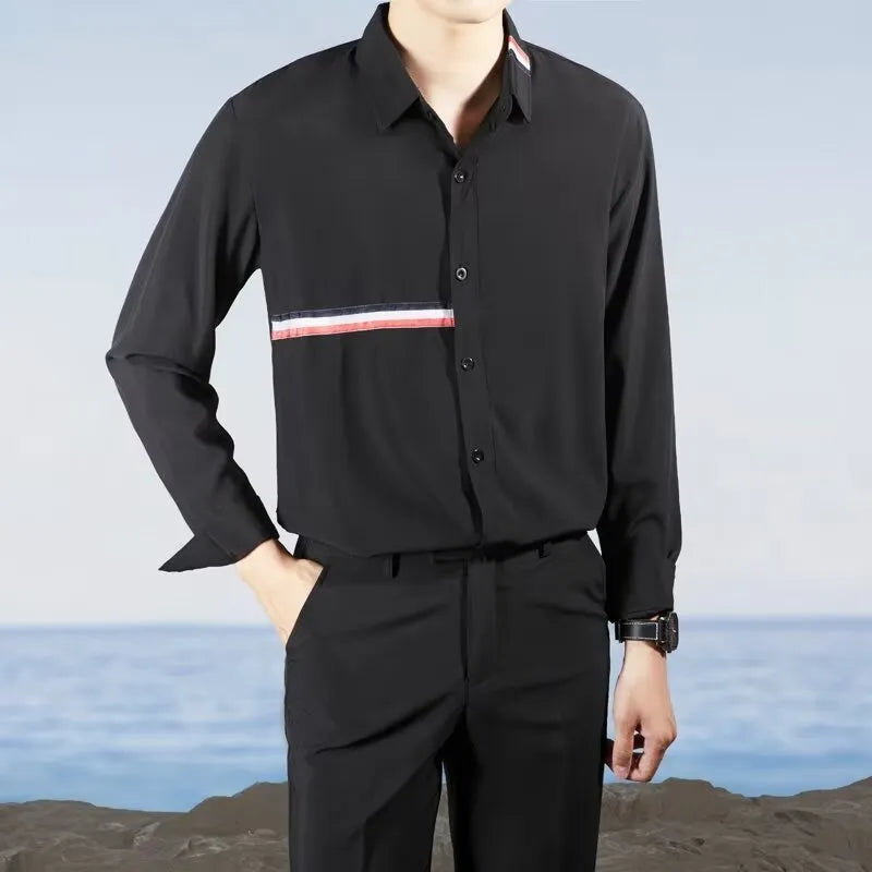 Man's loose-fit Hong Kong style cardigan shirt in a cotton blend fabric, shown in light blue.
