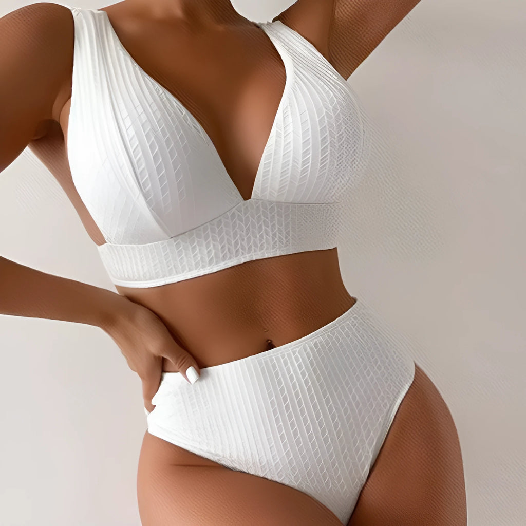 White solid colour backless bikini swimsuit for women on a mannequin