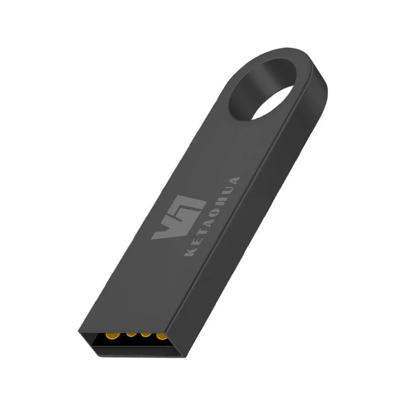 Silver metal USB flash drive shaped like a car on a black background.