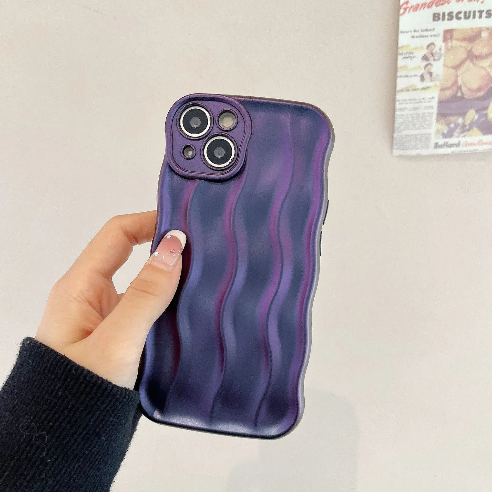 Silicone iPhone 17 case with a water ripple texture in wavy green, showing anti-falling protection.