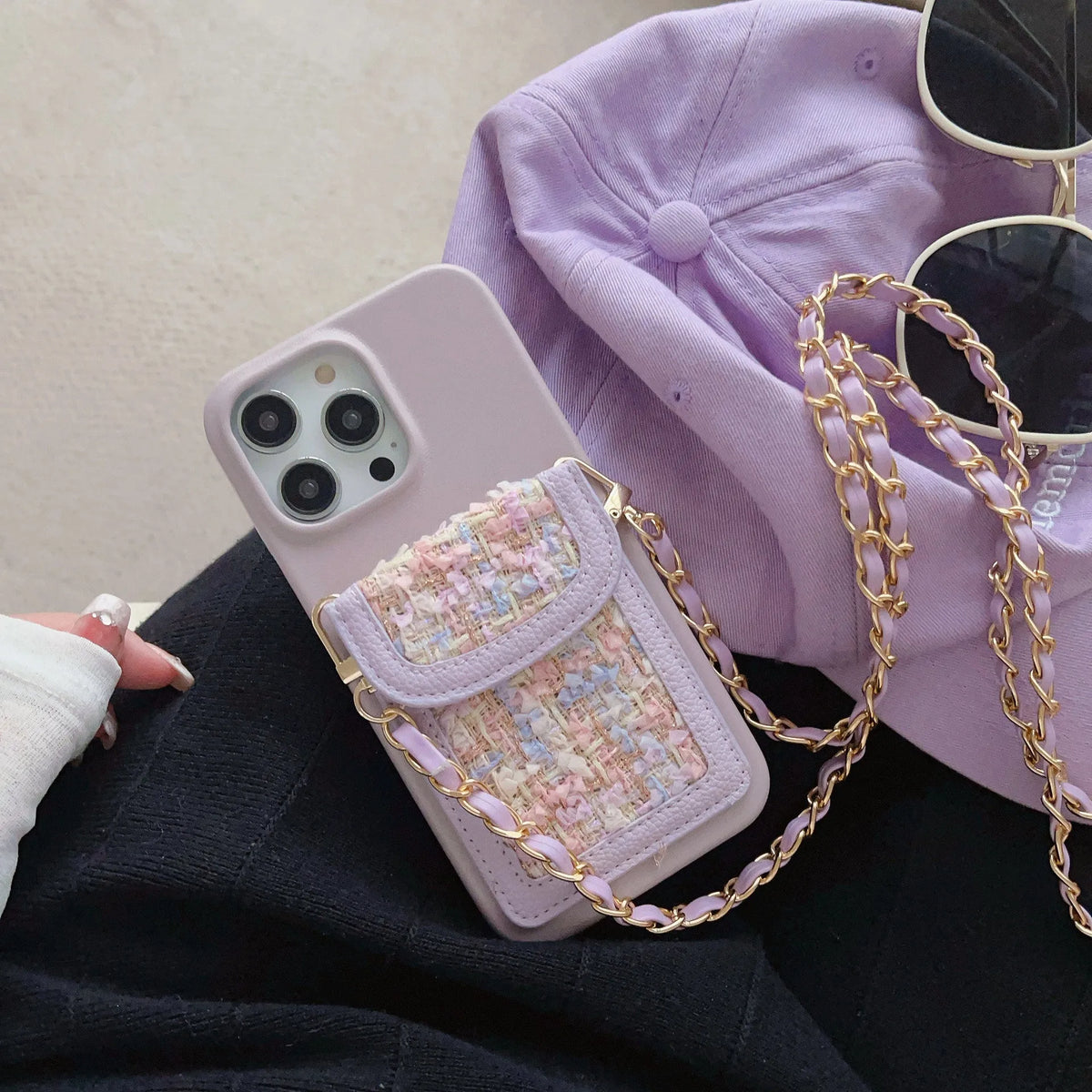 Crossbody chain card holder phone case in PU leather with frosted finish, shown in black, green, purple, white