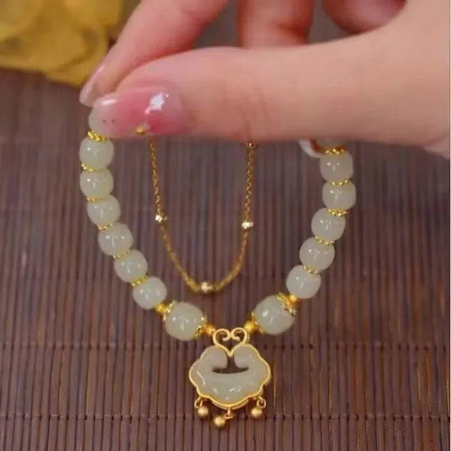 Green women's safety lock bell pendant bracelet with electroplated finish and drop-shaped charm