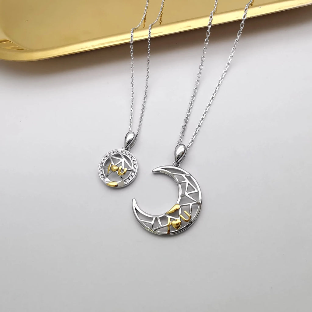Sun Moon Tooth Couple Necklace with copper electroplated pendants showing sun and moon symbols on cross chain