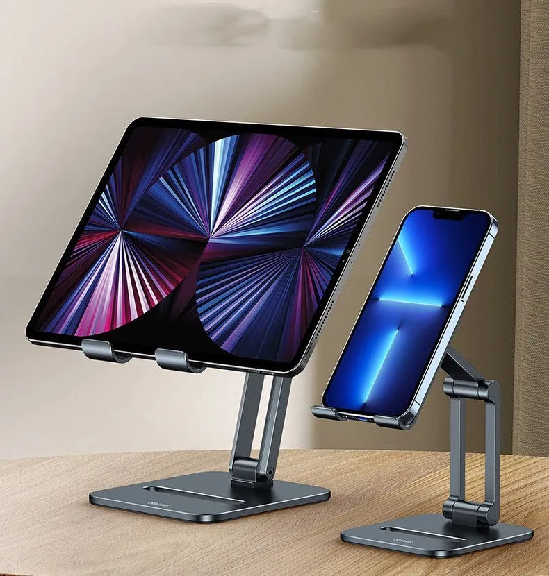 Deep space grey aluminium folding stand holding a tablet and a mobile phone on a desk.