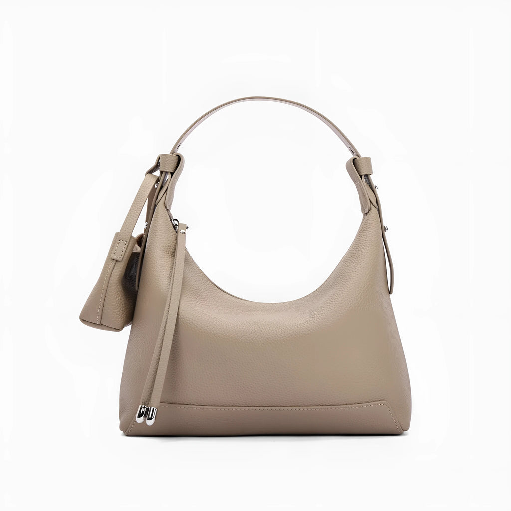 Simple grey genuine cowhide leather women's shoulder bag with visible stitching, shown on a neutral background.