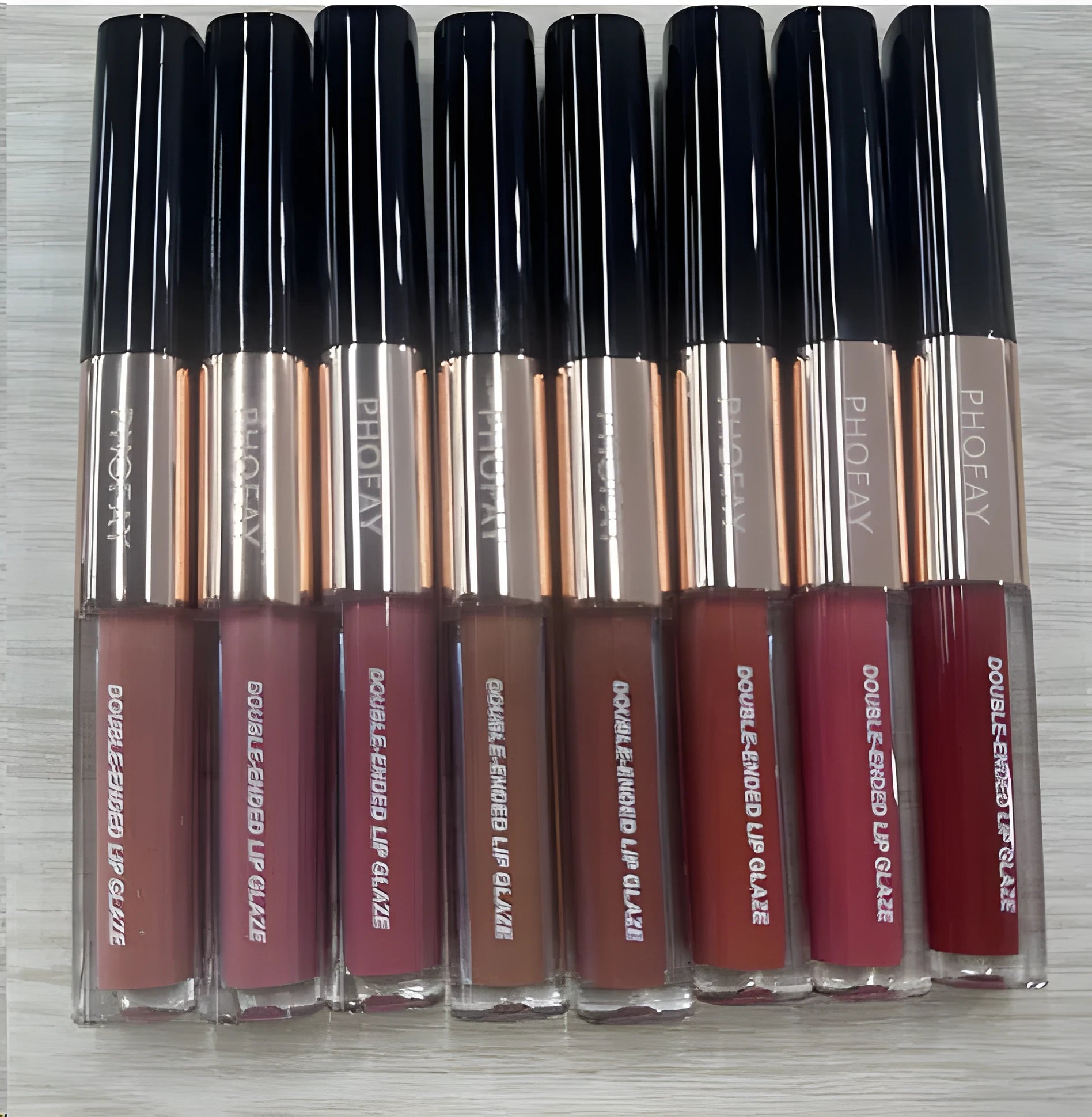 C-L021 double-head lip gloss with two applicator tips in non-stick cup packaging