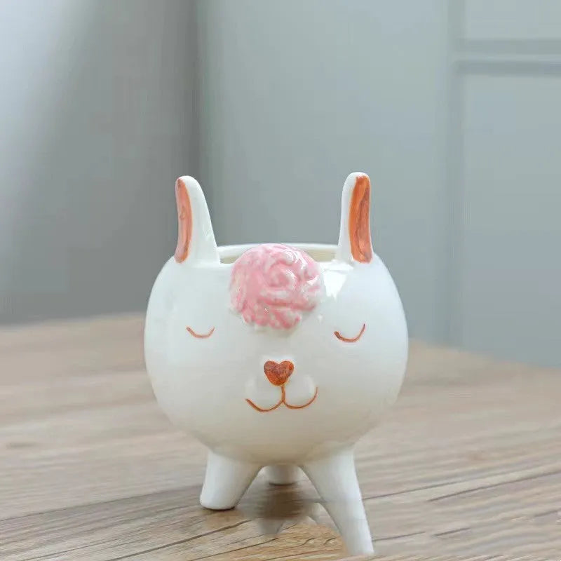 Ceramic succulent flowerpot with hand-painted cartoon animal and floral design in pastel colour