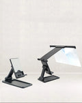 Black 12-inch mobile phone screen amplifier with detachable magnifier and phone holder in folded position