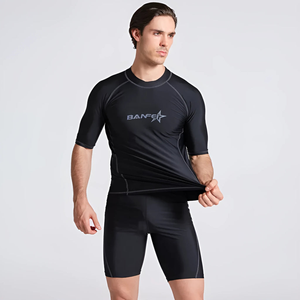 Men's blue quick-dry nylon two-piece swim set with half-sleeve top and swim pants laid flat