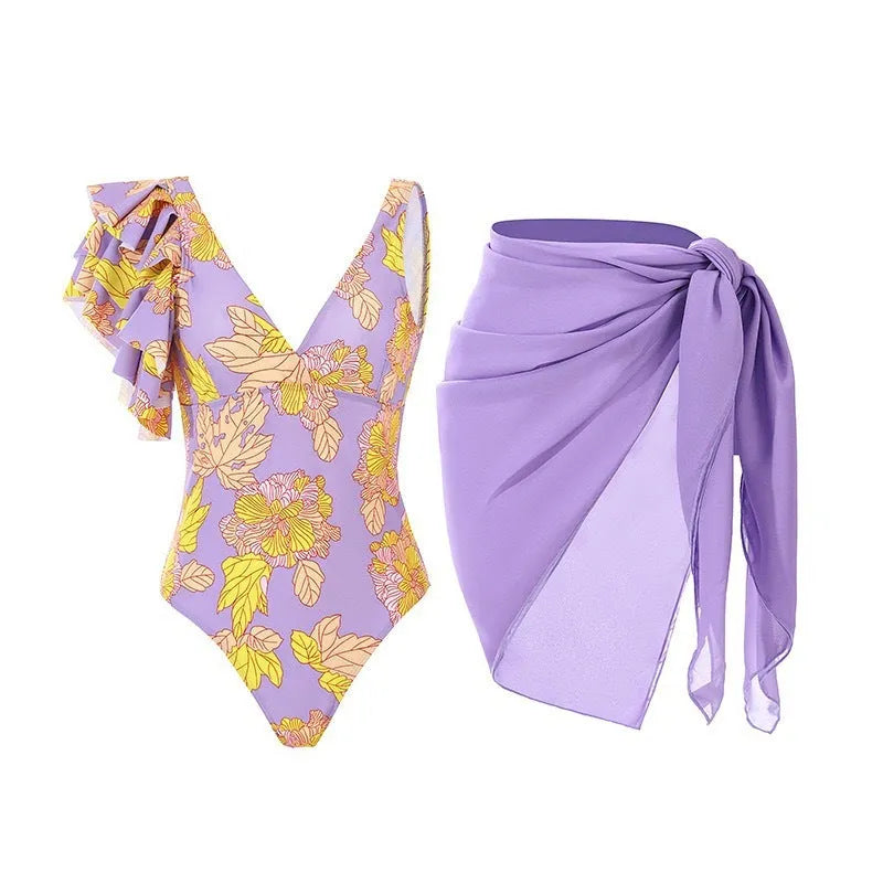 Women's spaghetti straps one-piece swimsuit with skirt in solid colour, showing adjustable straps and polyester fabric