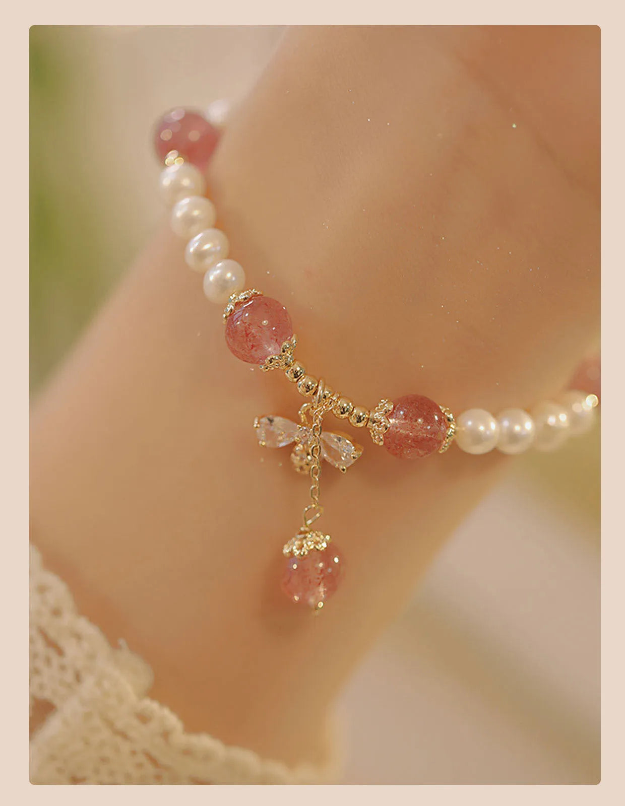 INS style women's bracelet with strawberry quartz stringed pearls and a central bow detail